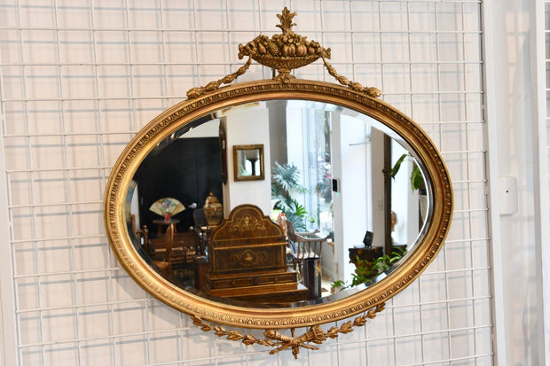 Antique Carved Oval Giltwood Fruit Crest Mirror