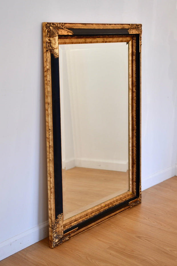 Rococo-Style Ebonized Giltwood Mirror